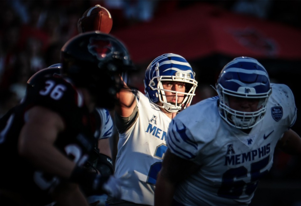 <strong>University of Memphis quarterback Seth Henigan (2) passes the ball during the first half of a Sept. 9, 2023 game at Arkansas State University.</strong> (Patrick Lantrip/The Daily Memphian)