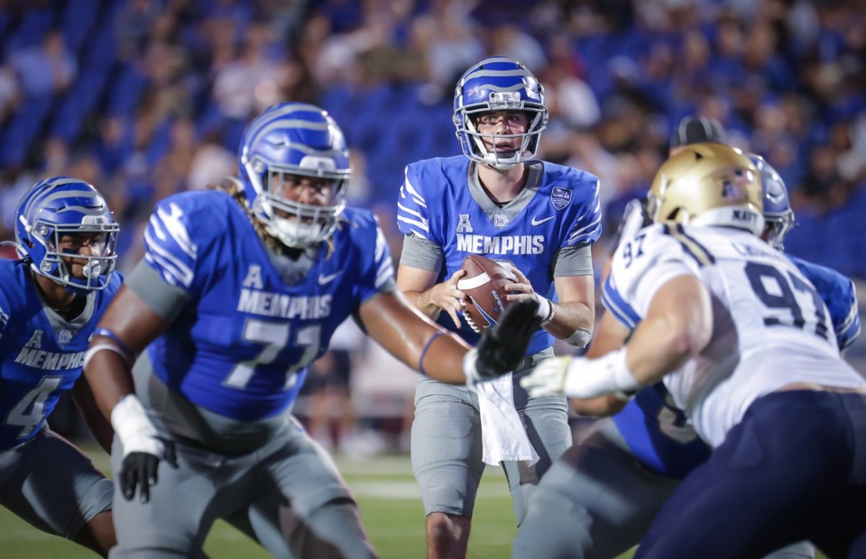 <strong>University of Memphis quarterback Seth Henigan (2) looks for an open receiver in the game gainst Navy at Simmons Bank Liberty Stadium on Sept. 14, 2023.</strong> (Patrick Lantrip/The Daily Memphian)