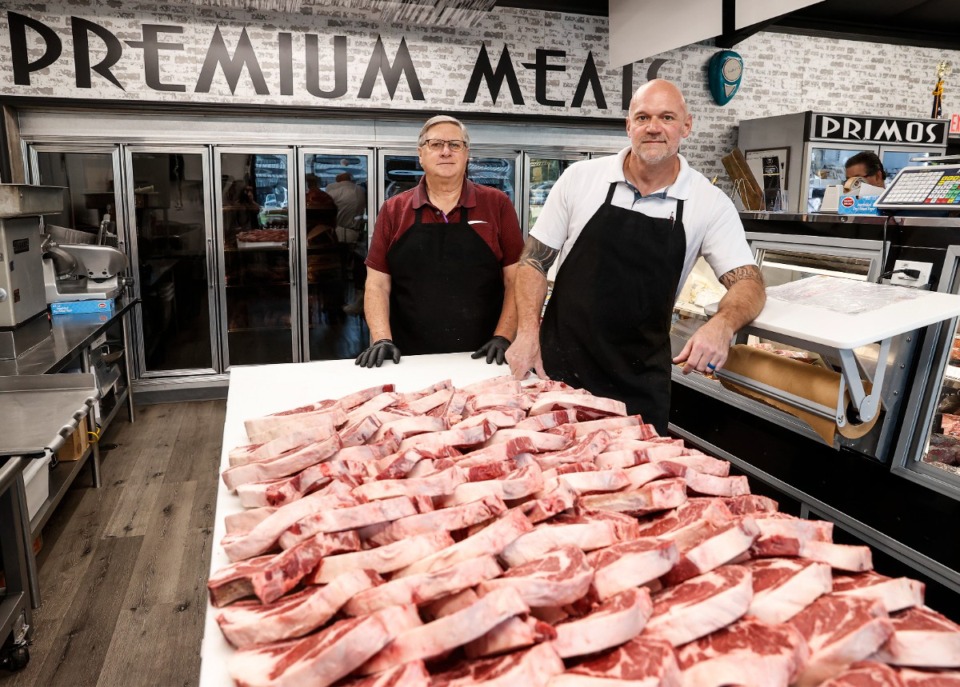 <strong>&ldquo;I just felt like I needed to go back to what I knew best and what I was comfortable in doing,&rdquo; said Frankie Perry (right), who opened Primos meat market in Hernando with his wife, Kaye (not pictured). Butcher&nbsp;Mike Palazola stands at left.</strong> (Mark Weber/The Daily Memphian)