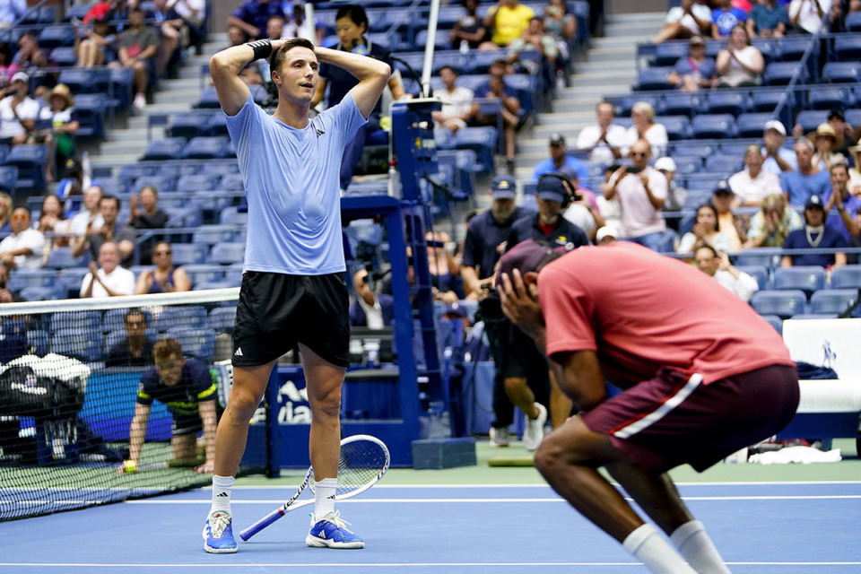 <strong>Joe Salisbury of Great Britain (left), and Rajeev Ram of the United States, react after defeating Rohan Bopanna of India and Matthew Ebden of Australia during the men's doubles final of the U.S. Open tennis championships Sept. 8 in New York.</strong> (Frank Franklin II/AP file)