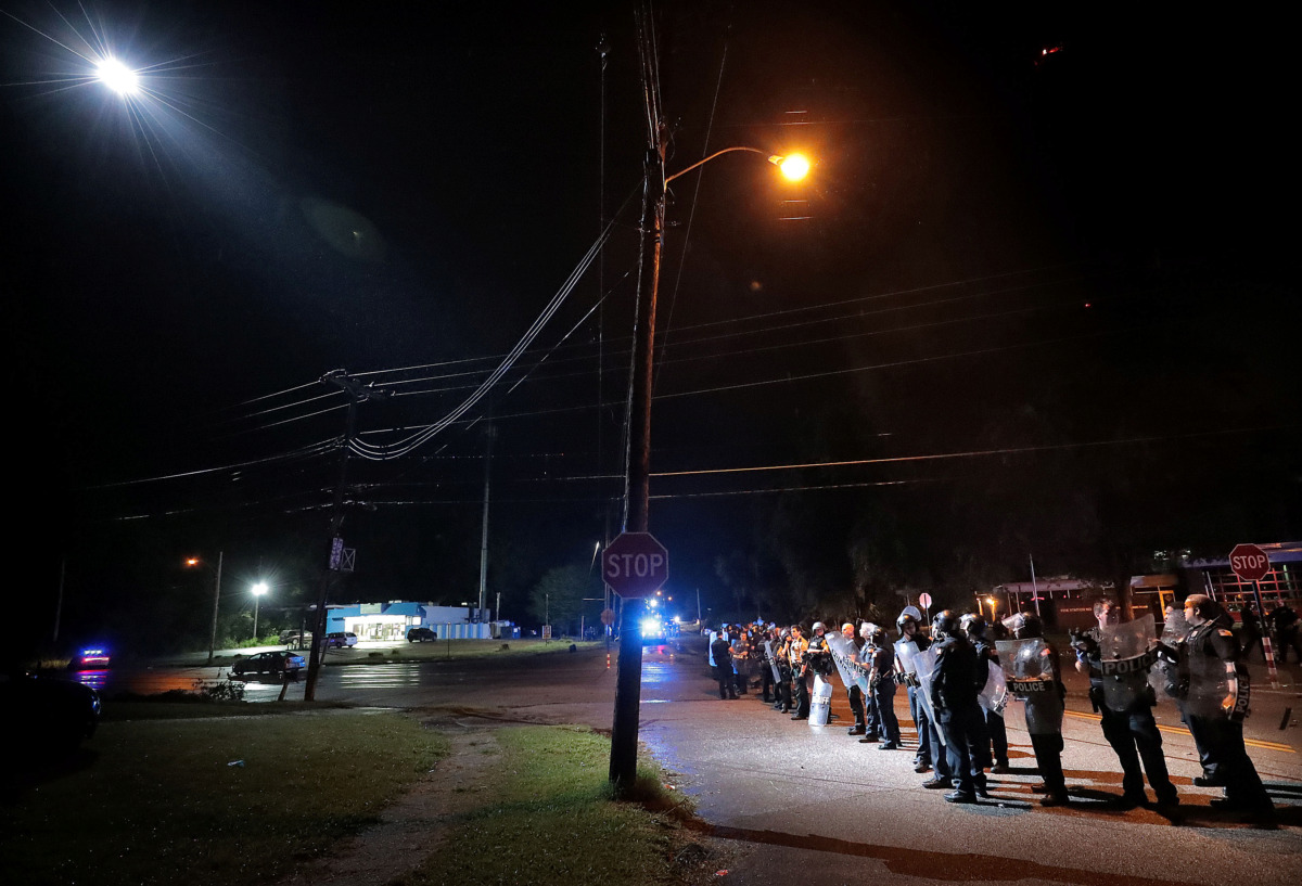 <strong>Memphis police maintain a perimeter around the crime scene after protesters took to the streets of Frayser in anger over the shooting a youth earlier Wednesday.&nbsp;</strong><span class="s1"><strong>Dozens of protesters clashed with police, throwing stones and tree limbs until police forces broke up the angry crowd with tear gas.</strong> (Jim Weber/Daily Memphian)</span>