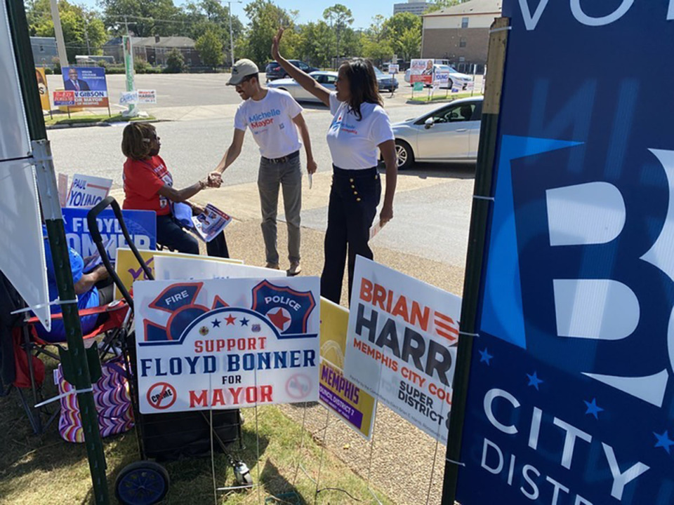 <strong>Memphis mayoral contender Michelle McKissack (right) checks in with campaign workers at the Mississippi Boulevard Christian Church early voting site.</strong> (Bill Dries/The Daily Memphian)