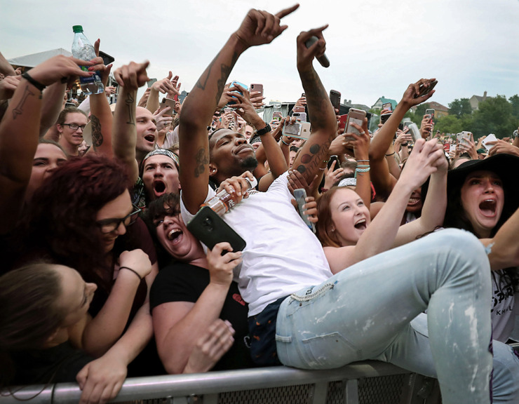 <strong>Memphis rapper BlocBoy JB dives into the crowd during the first day of the 2019 Beale Street Music Festival.</strong> (Patrick Lantrip/The Daily Memphian file)