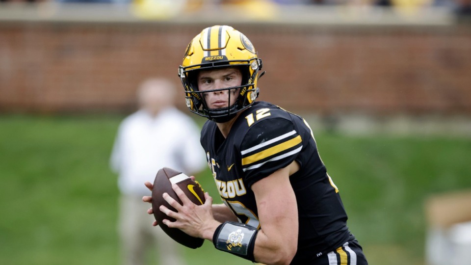 <strong>Missouri quarterback Brady Cook (12) during an NCAA football game on Saturday, Sept. 16, 2023 in Columbia, Mo.</strong> (AP Photo/Colin E. Braley)