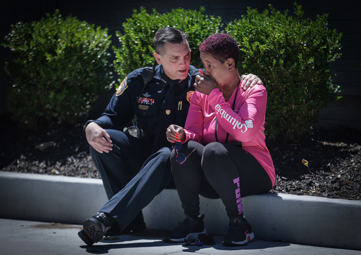 <strong>Deputy Chief Stephen Chandler comforts Marsha McKinney, mother of the suspect in an active shooter situation near the University of Memphis May 2, 2023.</strong> (Patrick Lantrip/The Daily Memphian file)