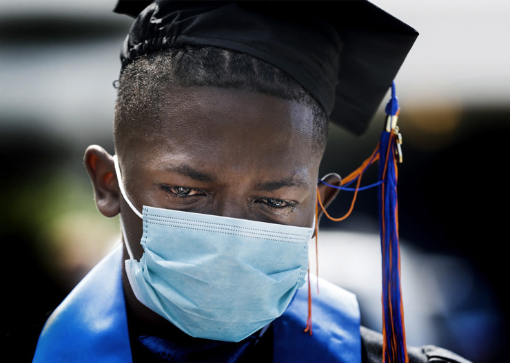<strong>KIPP Collegiate High School senior Temeico Johnson sheds tears after earning his diploma during a graduation ceremony on Tuesday, June 2, 2020.</strong> (Mark Weber/The Daily Memphian file)
