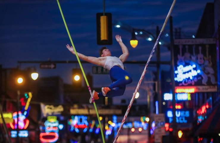 <strong>Matt Ludwig tumbles to the ground after an unsuccessful attempt during the pole vaulting portion of the Ed Murphey Classic on Beale Street on July 30, 2022.</strong> (Patrick Lantrip/The Daily Memphian file)