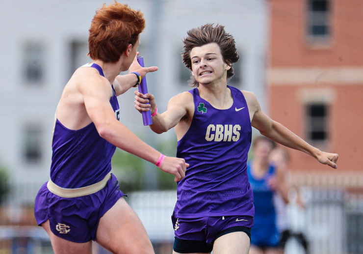 <strong>Christian Brothers High School relay runner Chaz Jones hands the baton off to teammate Jake Ryan during the state championship meet in Murfreesboro, Tennessee, on May 25, 2022.</strong> (Patrick Lantrip/The Daily Memphian file)
