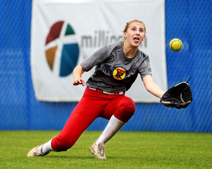 <strong>Tipton-Rosemark Academy's Gracen Williams dives for a catch during an April 30, 2021, softball practice.</strong> (Patrick Lantrip/The Daily Memphian file)