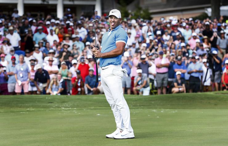 <strong>PGA golfer Brooks Koepka reacts after missing a birdie putt at hole 18 while on his way to winning the WGC-FedEx St. Jude Invitational at TPC Southwind, Sunday, July 28, 2019. Koepka shot 16-under for the tournament and 5-under on the final day.</strong> (Mark Weber/The Daily Memphian file)