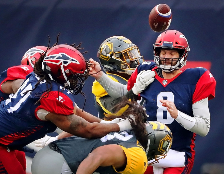 <strong>Myles Nash (91) of the San Diego Fleet knocks away a pass attempt by Memphis Express quarterback Zach Mettenberger (8) during the American Football league game at the Liberty Bowl on March 2, 2019.</strong> (Jim Weber/The Daily Memphian file)