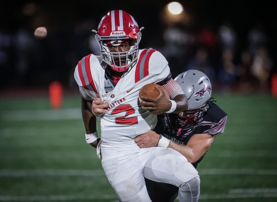 <strong>Germantown quarterback Cordero Walker (2) runs for a first down against Collierville on Sept. 22, 2023.</strong> (Patrick Lantrip/The Daily Memphian)
