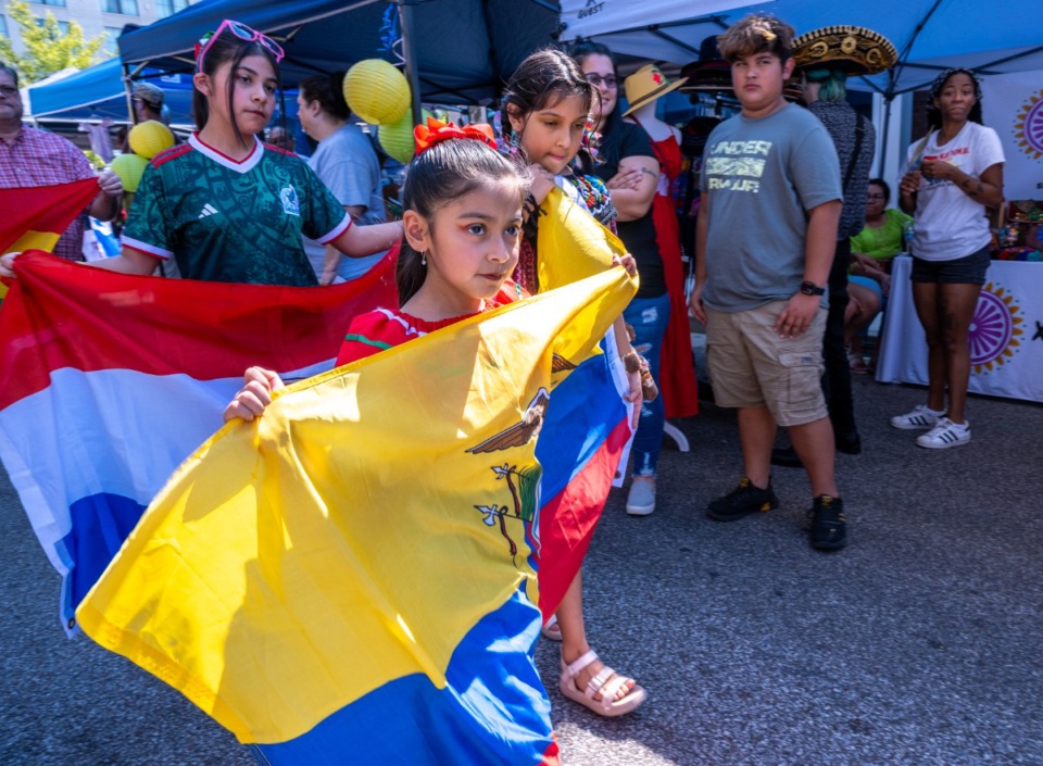 <strong>A parade of flags of Latin America makes its way through the Latin Fest 901 at Overton Square, Saturday, Sept. 23, 2023.</strong> (Greg Campbell/Special to The Daily Memphian)
