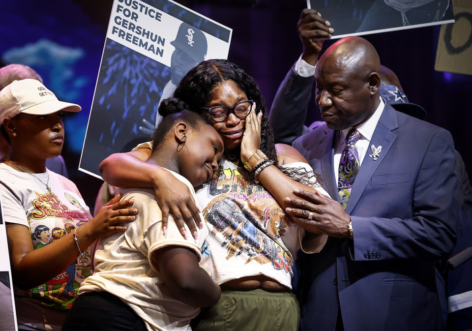<strong>Attorney Ben Crump, (right) comforts Gershun Freeman&rsquo;s wife Nicole Freeman (middle) and daughter Taylor Freeman (left) during a press conference on Monday, Sept. 25.</strong> (Mark Weber/The Daily Memphian)