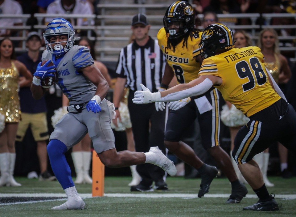 <strong>University of Memphis running back Blake Watson (4) scampers in for a touchdown during a Sept. 23, 2023 game against the University of Missouri in St. Louis.</strong> (Patrick Lantrip/The Daily Memphian)