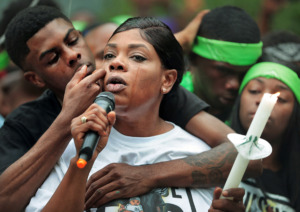<strong>As Blake Webber wipes away her tears, Jaleta Clark, the mother of 20-year-old Brandon Webber, who was shot by U.S. Marshals on Wednesday, June 12, 2019, remembers her son during a vigil on Durham Avenue in Frayser Friday evening. Hundreds of neighborhood residents gathered with Webber's family to denounce the shooting and the violence that ensued.</strong> (Jim Weber/Daily Memphian)