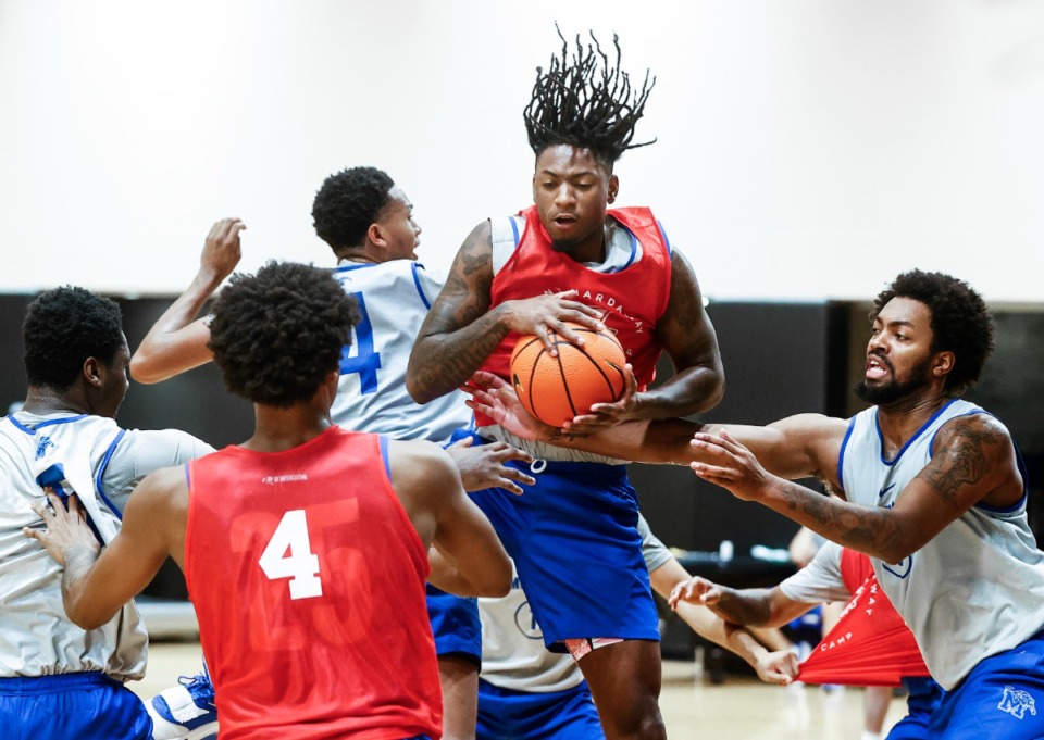 <strong>University of Memphis guard Jaykwon Walton (middle) grabs a rebound during practice on Wednesday, Sept. 27, 2023.</strong> (Mark Weber/The Daily Memphian)
