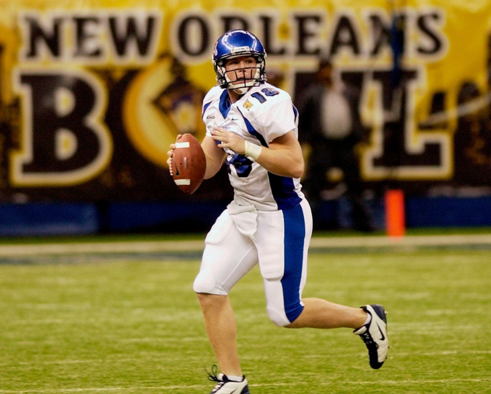 <strong>Memphis quarterback Danny Wimprine (18) in action during the New Orleans Bowl against North Texas in the Louisiana Superdome Tuesday, Dec. 16, 2003. Wimprine and the 2003 Memphis Tigers football team will be honored at Saturday&rsquo;s Memphis-Boise State game.</strong> (Andrew J. Cohoon/AP file)