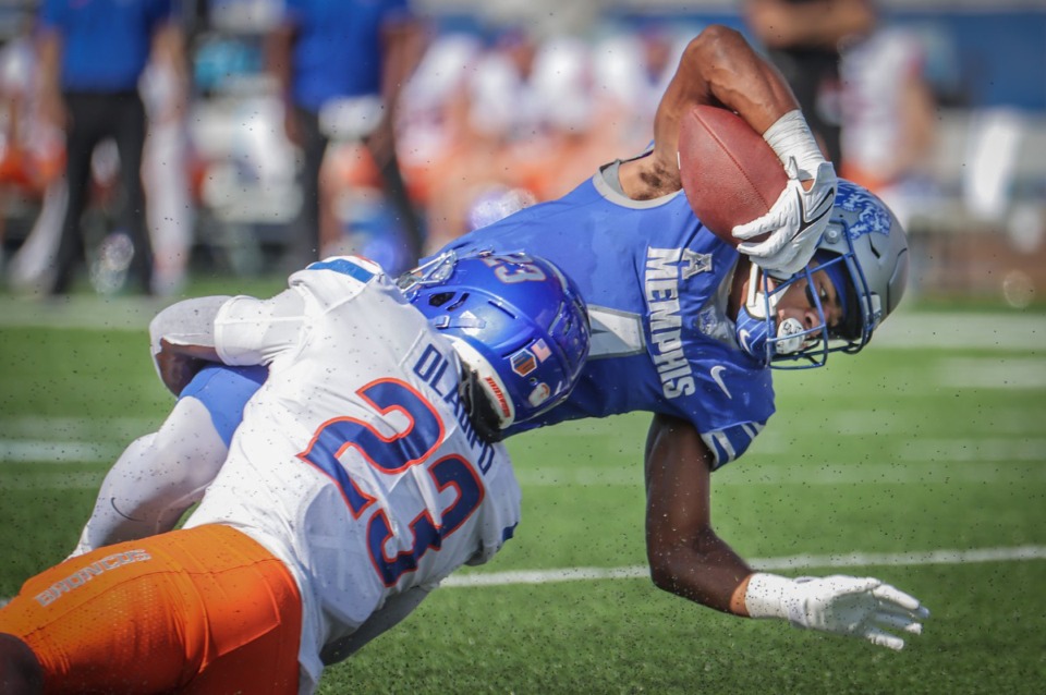 <strong>University of Memphis running back Blake Watson (4) gets stopped short of a first down during a Sept. 30, 2023 game against Boise St.</strong> (Patrick Lantrip/The Daily Memphian)