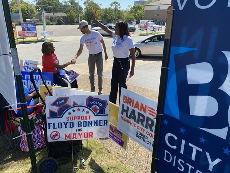 <strong>Memphis mayoral contender Michelle McKissack, right, checks in with campaign workers at the Mississippi Boulevard Christian Church early voting site.</strong> (Bill Dries/The Daily Memphian)