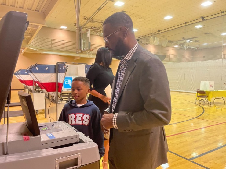 <strong>Paul Young and his family (son Paxton, 8), helped his father vote at First Evangelical Church in East Memphis.</strong> (Samuel Hardiman/The Daily Memphian)
