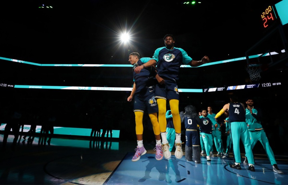 <strong>Memphis Grizzlies guard forward Jaren Jackson Jr. and guard Desmond Bane are introduced before a Dec. 31, 2021 game against the San Antonio Spurs in the FedExForum.</strong> (Patrick Lantrip/Daily Memphian)
