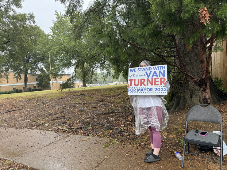 <strong>Campaign worker, Jessica Hendrix, stumps for Van Turner in the rain.</strong> (Alys Drake/The Daily Memphian)