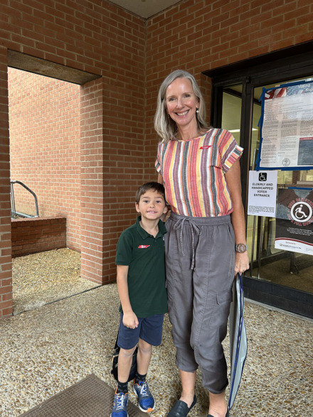 <strong>Kellye Stelling picked up her son Braxton from White Station ahead of voting Oct. 5, 2023. He wanted to go with her to the polling place for the sticker, she said.</strong> (Abigail Warren/The Daily Memphian)