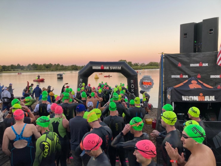 <strong>As the sun rises, swimers wait to start the swim portion of the St. Jude Ironman 70.3 Memphis race that was held Saturday, Oct. 7, at Shelby Farms Park.</strong> (David Boyd/The Daily Memphian)