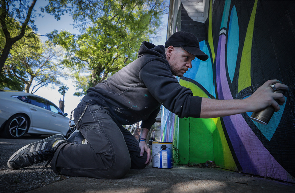 <strong>Local artist Sinned works on a mural for Paint Memphis at The Ravine Oct. 7.</strong> (Patrick Lantrip/The Daily Memphian)