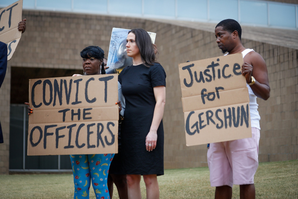 <strong>Sara McKinney (center), one of the attorneys representing Gershun Freeman&rsquo;s family in a wrongful death suit, stands outside of 201 Poplar on Oct. 4, 2023, the day before the one-year anniversary of his death.</strong> (Aarron Fleming/The Daily Memphian)