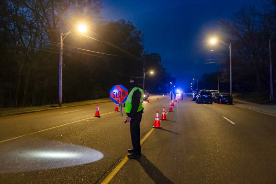 <strong>Memphis police direct traffic under LED streetlights March 20.</strong> (Ziggy Mack/Special to The Daily Memphian)