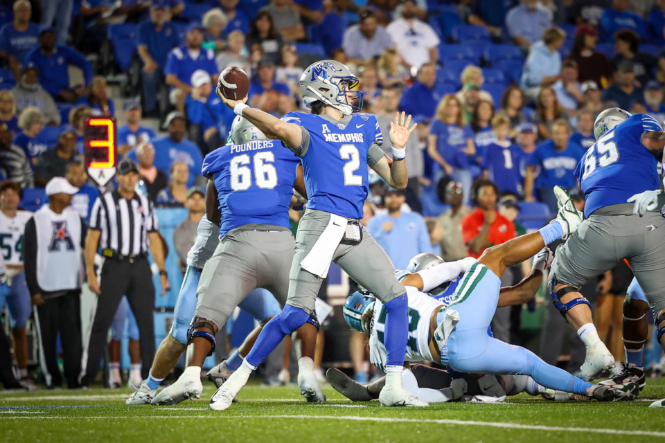 <strong>University of Memphis quarterback Seth Henigan (2) uncorks a pass against Tulane University on Oct. 13, 2023, at Simmons Bank Liberty Stadium.</strong> (Wes Hale/Special to The Daily Memphian)