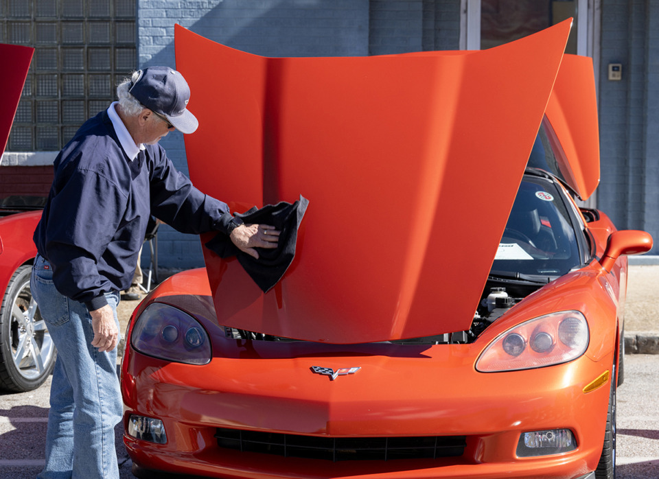 <strong>David Lentz polishes his 2012 Corvette for the Edge Motor Festival in the Edge District, Saturday, Oct. 14.</strong> (Greg Campbell/Special to The Daily Memphian)