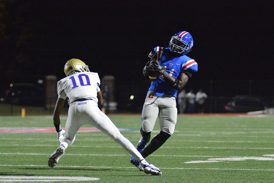 <strong>Max Williams of MUS grabs the ball for an interception intended for Jeremiah Robinson (10) on Friday, Oct. 13.</strong> (Joshua White/Special to The Daily Memphian)
