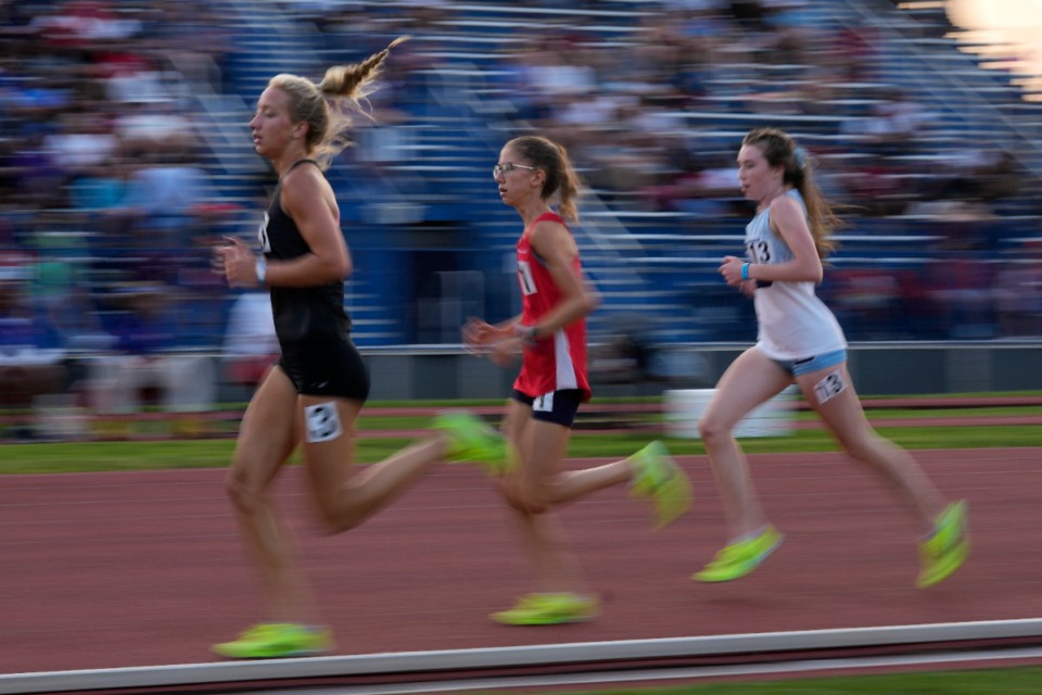 <strong>Zoe Marsh, left, of Houston High School, wins the girls&rsquo; 3200 meter run during the Class AAA track and field championships Thursday, May 25, 2023, in Murfreesboro.</strong> (Mark Humphrey for The Daily Memphian)
