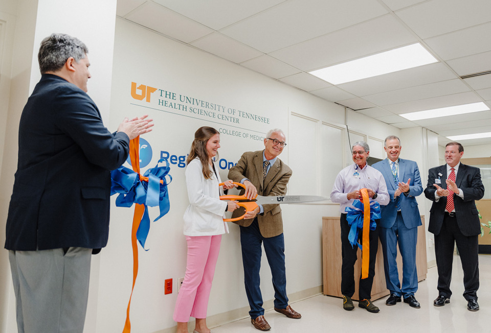 <strong>Dr. Peter Buckley, University of Tennessee Health Science Center chancellor, and medical student Corinne Gibson cut the ribbon on the new UTHSC lounge at Regional One Health, where students and residents of the College of Medicine can engage in peer-to-peer learning, research and respite.</strong> (Courtesy UTHSC)