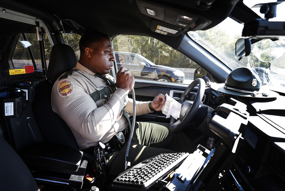 <strong>Tennessee Highway Patrol trooper Devonte Quinn conducts a traffic stop on I-40 on Wednesday, October 18, 2023.</strong> (Mark Weber/The Daily Memphian)