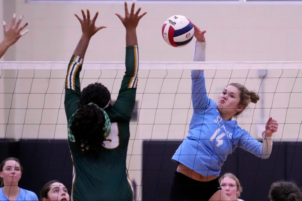 <strong>St. Agnes Academy's Dani Mulrooney (14) spikes the ball against Briarcrest Christian School's Jaidyn Harris (23) during the Division 2-AA high school volleyball tournament championship game Thursday, Oct. 19, 2023, in Murfreesboro, Tenn.</strong> (Mark Humphrey/Special to The Daily Memphian)