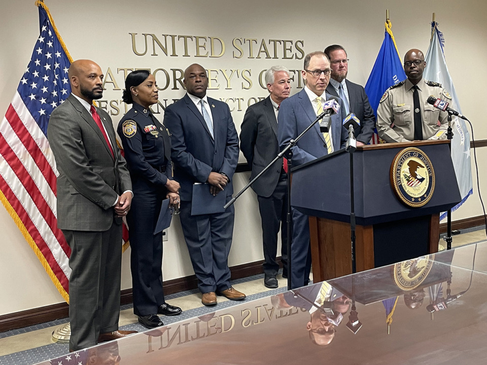 <strong>U.S. Attorney Kevin G. Ritz, flanked by local and national law enforcement leaders, discusses 21 federal indictments that resulted from a multi-agency operation targeting violent crime Oct. 20.</strong> (Julia Baker/The Daily Memphian)