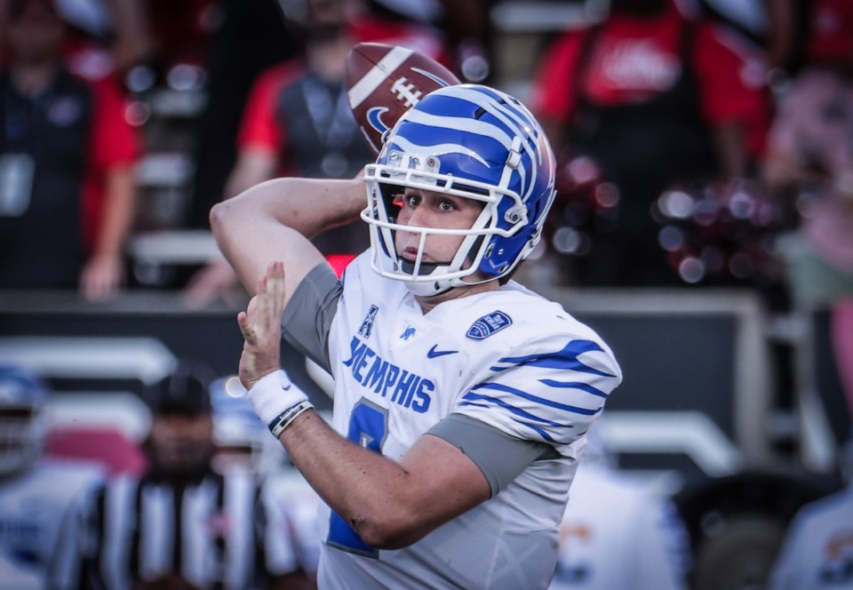 <strong>University of Memphis quarterback Seth Henigan said being the son of a high school football coach influenced his drive to play well. &ldquo;He definitely held me to a high standard being his son and who he needed to play well in order for our team to be successful because we had so much talent on my high school team.&rdquo;</strong> (Patrick Lantrip/The Daily Memphian)