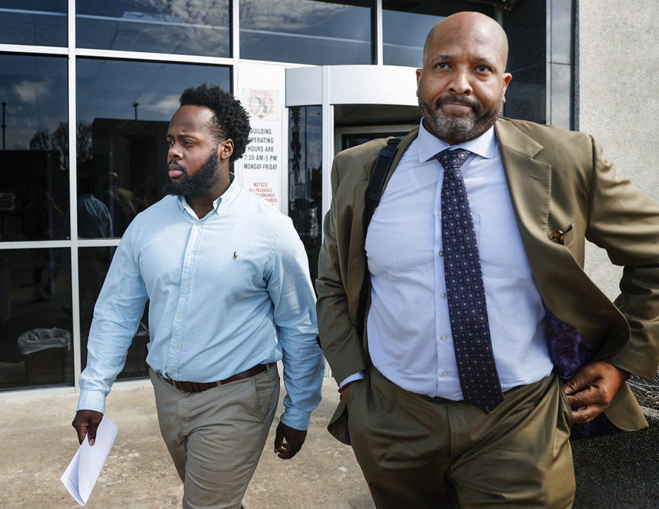 <strong>Former Memphis police officer Tadarrius Bean (left) along with his attorney John Keith Perry (right) leave the Odell Horton Federal Courthouse Sept. 13.</strong> (Mark Weber/The Daily Memphian file)