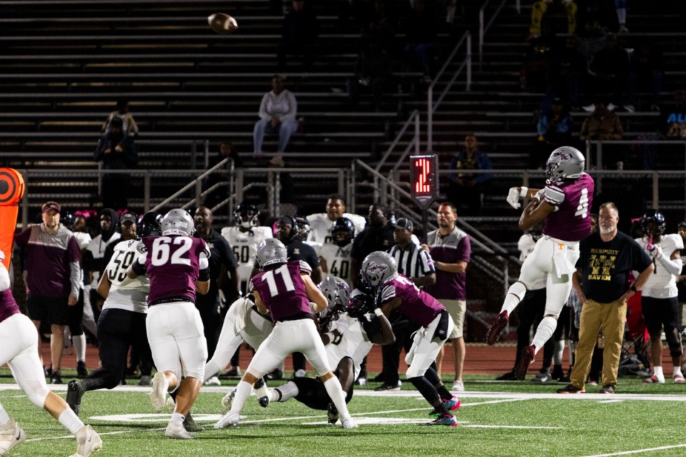 <strong>Collierville&rsquo;s Joakim Dodson passes for a touchdown during Friday&rsquo;s game against Whitehaven.</strong> (Brad Vest/Special to The Daily Memphian file)