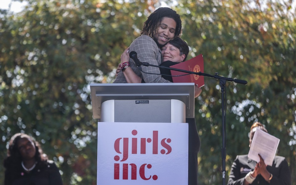 <strong>State Rep. Torrey Harris hugs former CEO and President Lisa Moore at a ribbon cutting for a new facility at Girls Inc.'s Frayser location Oct. 21, 2023.</strong> (Patrick Lantrip/The Daily Memphian)