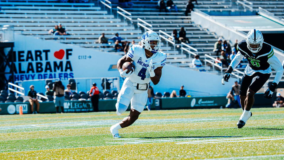 <strong>Memphis Tigers running back Blake Watson, 4, runs with the ball in a game against the UAB Blazers Oct. 21.</strong> (Courtesy Memphis Athletics)