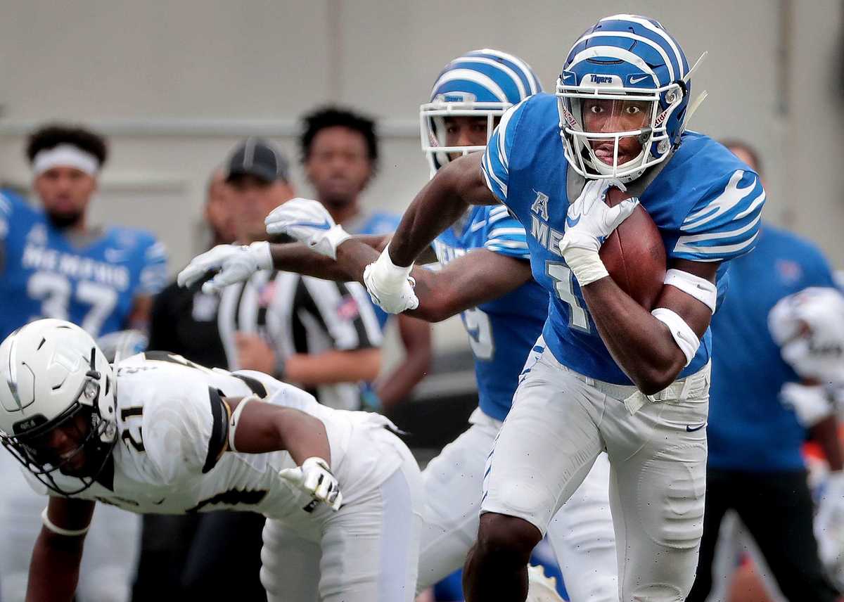 <strong>University of Memphis receiver Damonte Coxie (10) looks for an opening on a run during the Tigers' disappointing 31-30 loss to UCF at the Liberty Bowl Memorial Stadium on Oct. 13, 2018.</strong> (Jim Weber/Daily Memphian)