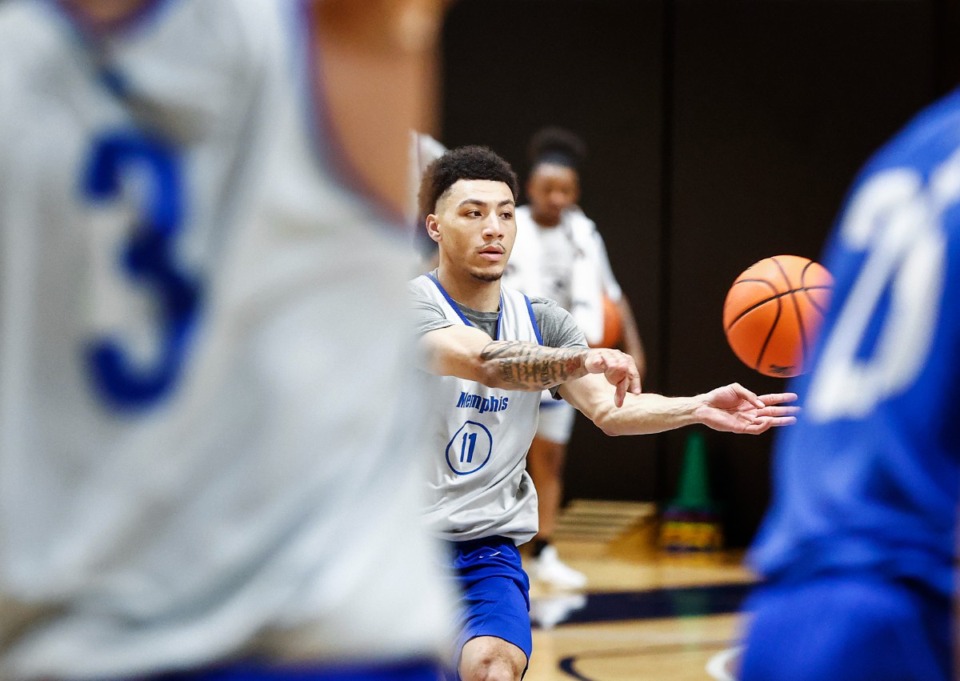 <strong>University of Memphis guard Jahvon Quinerly makes a pass during practice on Wednesday, Sept. 27, 2023.</strong> (Mark Weber/The Daily Memphian)