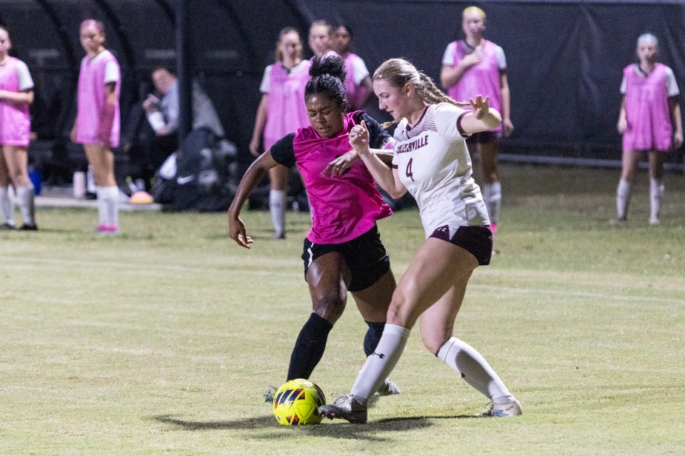 <strong>Houston&rsquo;s Leah Freeman, left, and Collierville&rsquo;s Mabry Klocke, right, battle for the ball during a Collierville at Houston girls soccer game.</strong> (Brad Vest/Special to The Daily Memphian)