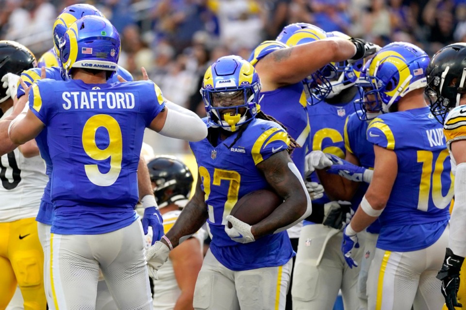 <strong>Los Angeles Rams running back Darrell Henderson, center, reacts after scoring a touchdown during the second half of an NFL football game against the Pittsburgh Steelers Sunday, Oct. 22, 2023, in Inglewood, Calif.</strong> (AP Photo/Ashley Landis)