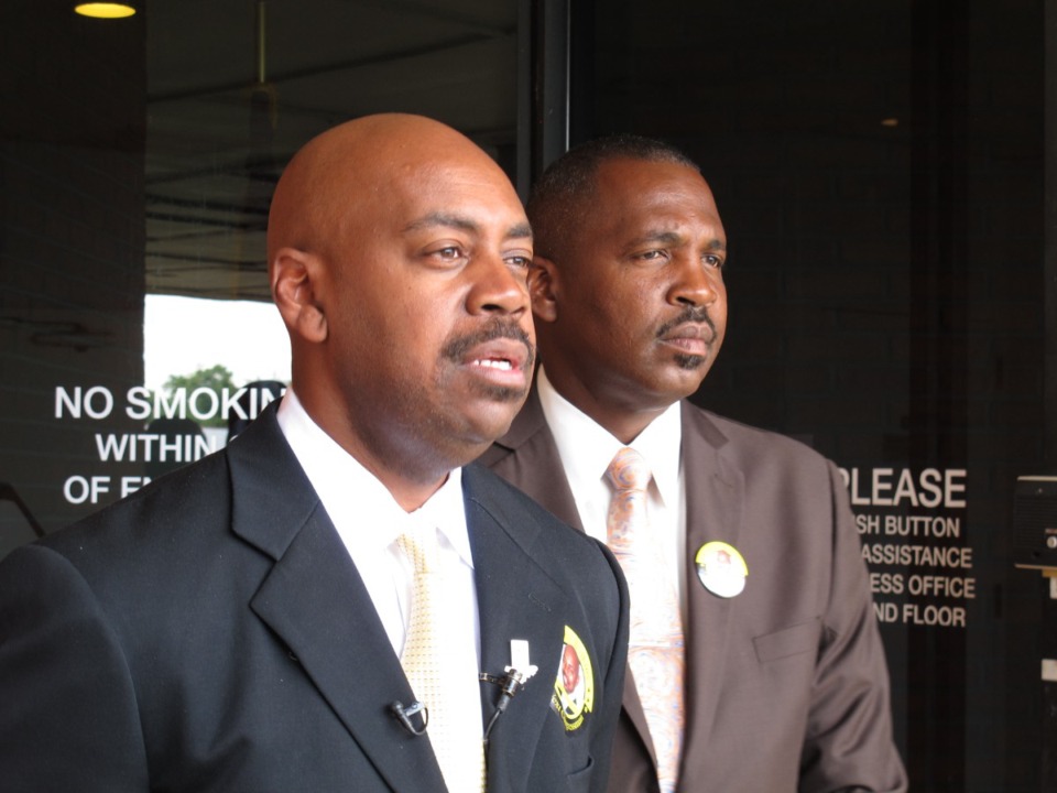 <strong>Attorney Ricky Wilkins, left, speaks at a news conference July 29, 2014, in Memphis. Supporter Gregory Stokes is at his right.</strong> (Adrian Sainz/AP file)